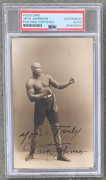 JOHNSON, JACK SIGNED REAL PHOTO POSTCARD (AS WORLD HEAVYWEIGHT CHAMPION-PSA/DNA AUTHENTICATED)