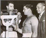 MARCIANO, ROCKY-DON COCKELL WIRE PHOTO (1955-WEIGHING IN)