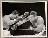 MARCIANO, ROCKY-ARCHIE MOORE ORIGINAL WIRE PHOTO (1955-2ND ROUND)