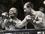 MARCIANO, ROCKY-JERSEY JOE WALCOTT I ORIGINAL WIRE PHOTO (1952-FAMOUS PUNCH)