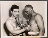 MARCIANO, ROCKY-JERSEY JOE WALCOTT II ORIGINAL WIRE PHOTO (1953-PRE FIGHT PHYSICAL)