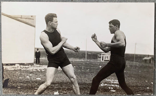 MCCARTY, LUTHER & ARTHUR PELKEY REAL PHOTO POSTCARD (1913-SQUARING OFF BEFORE THE FIGHT)
