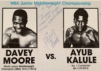 MOORE, DAVEY-AYUB KALULE SIGNED ON SITE POSTER (1982-SIGNED BY ALEXIS ARGUELLO)