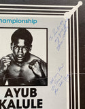 MOORE, DAVEY-AYUB KALULE SIGNED ON SITE POSTER (1982-SIGNED BY ALEXIS ARGUELLO)