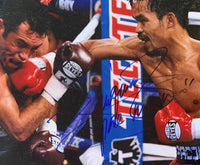 PACQUIAO, MANNY SIGNED LARGE FORMAT ACTION PHOTO (JSA AUTHENTICATED)