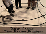 LOUIS, JOE "THE BROWN BOMBER" RING ART TOY (CIRCA 1930'S)
