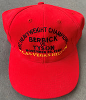 TYSON, MIKE-TREVOR BERBICK ORIGINAL SOUVENIR HAT (1986)